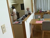 Big ass hotty Erina Nagasawa performing blow dick in kitchen