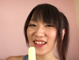 Cute Asian teen, Nana Usami, in swimsuit sucks and eats sperm picture 12