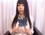 Shameless Japanese school girl playing with her huge dildo