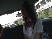 Asian teen, Anna Oguri in her school uniform has car sex