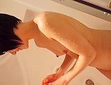 Pretty teen Haruki Karen stuns with a hot shower masturbation