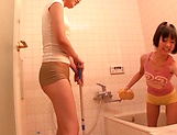 Horny lesbian babes Ryo Sena, and Rabu Saotome have fun in the bathroom