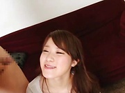 Gorgeous young Asian babe Erina Kahara gives a hot blowjob
