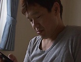 Horny babe Harura Mori gives a hot blowjob in the hallway