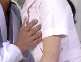 Sexy nurse Hitomi Kouya in stockings gets hardcore banging from doctor picture 12