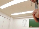 Naughty Japanese AV model is a sexy teacher giving hot footjob picture 33
