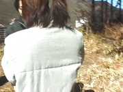 Kayoko Uesugi, mature Asian babe gives outdoor blowjob