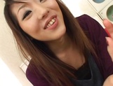Pretty Japanese babe enjoys herself in solo masturbation picture 14