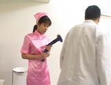 Sexy Asian nurse in pink stimulates her patient with her mouth picture 33