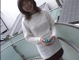 Mischievous Japnese teen, Riho Mishima, gives a blowjob in a toilet on pov picture 2