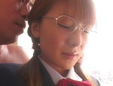 Asian schoolgirl with sexy glasses gets fucked by teacher