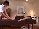 Big tits busty Asian milf enjoys a seductive massage picture 32