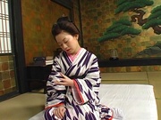 Gorgeous mature Japanese AV Model gives a handjob and rides on dick