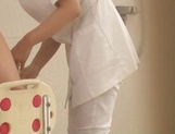 Kotomi Saeki naughty Asian nurse enjoys giving handjobs picture 15