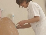 Helpful Japanese nurse Kotomi Saeki licks balls and sucks cock picture 16