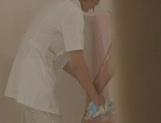 Kotomi Saeki naughty Asian nurse enjoys giving handjobs picture 21