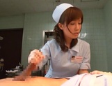 Crazy nurse Minami Kojima gives a hand job and rides cock picture 18