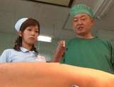 Crazy nurse Minami Kojima gives a hand job and rides cock picture 23