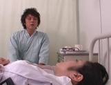Busty Japanese Minako Komukai nurse plays with a big cock picture 2