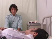Busty Japanese Minako Komukai nurse plays with a big cock