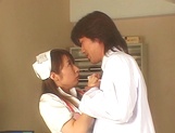 Sultry Japanese nurse in sexy white stockings is fucked by a horny doc picture 11