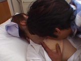 Hot nurse Ria Sakurai in a hardcore sex action gets cum on tits picture 20