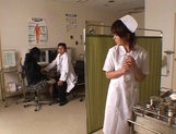 Young Asian babe Ai Himeno gets her tits played with by the doc picture 13