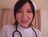 Busty Japanese AV Model is a nurse who loves to fuck in hardcore picture 10
