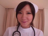 Busty Japanese AV Model is a nurse who loves to fuck in hardcore picture 1