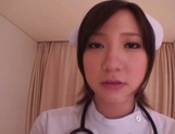 Busty Japanese AV Model is a nurse who loves to fuck in hardcore picture 7