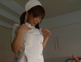Busty nurse in sexy stockings Minami Kojima sucks and rides dick on pov picture 40