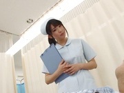 Crazy Japanese nurse in white stockings sits on a face gives a blow