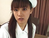 Delicious Asian nurse Akane Oozora strips and gets rear fuck