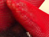 Erika Kurisu is a hot Asian nurse in her red stockings giving a hot headfuck picture 16