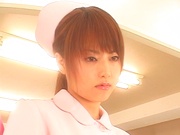 Japanese AV Model plays a sexy nurse getting fingered and fucked