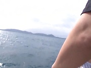Enticing Asian honey on a boat pleasing hard cock