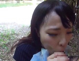 Gorgeous Asian babe sucks dick and eats sperm outdoors picture 37