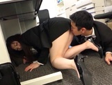 Long-haired Japanese milf gets fucked under a table picture 18
