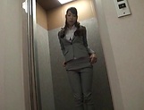 Mio Kayama fingers her pussy in the office