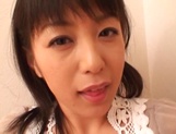 Japanese milf Nana Nanami gets filmed while sucking and fucking picture 18