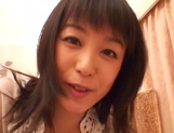 Japanese milf Nana Nanami gets filmed while sucking and fucking picture 22