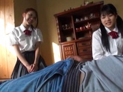 Two naughty Japanese schoolgirls share cock and ride it passionately