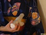 Arika Takarano Asian doll gets a dildo penetration