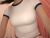 Sporty Asian teen Kurumi Tanigawa boasts of her tits and shaved pussy