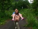 Hedonistic Asian milf fucks by the side of the road picture 15