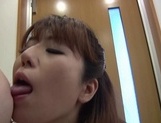 Busty Japanese seductress Naho Hazuki deepthroats a massive guy picture 60