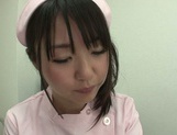Naughty Asian nurse Tsubomi gives her patient intense anal exam picture 34