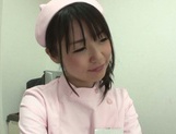 Naughty Asian nurse Tsubomi gives her patient intense anal exam picture 36