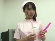 Naughty Asian nurse Tsubomi gives her patient intense anal exam