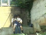 Asian sweetie and her guy having sex on the steps outside picture 14